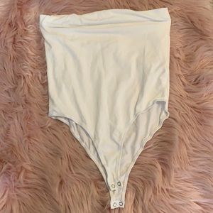 White strapless bodysuit.